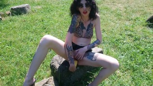 Shameless Lucy Ravenblood fucking pussy with corn in public