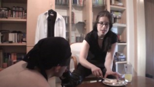 slave maskjoe get his breakfast from her boots