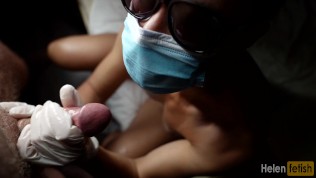Fingering a big cock in a medical mask and latex gloves