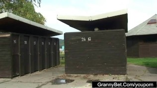 Old blonde is banged by young guy outdoors