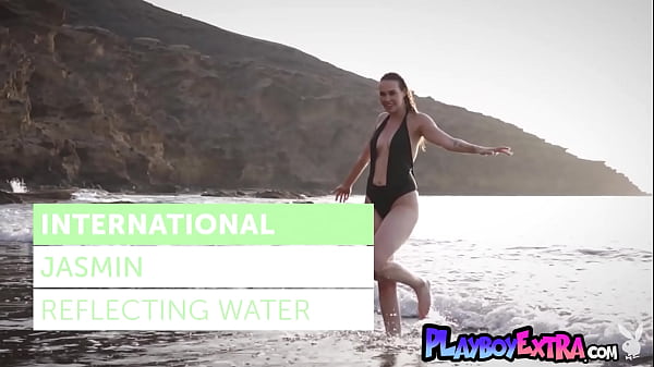 Passionate German babe Jasmin Furry reveals her wet pussy at the beach